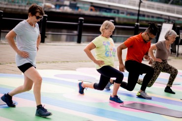 A group of people doing exercises on Newcastle’s Quayside