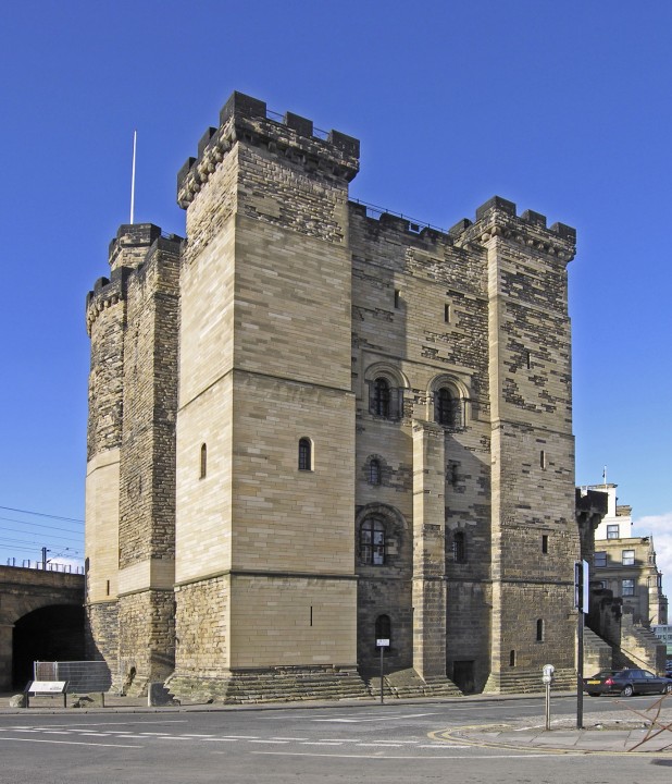 An image of the Castle Keep at Newcastle Castle against a bright blue sky, Photo by Hans Peter Schaefer / CC BY-SA 3.0